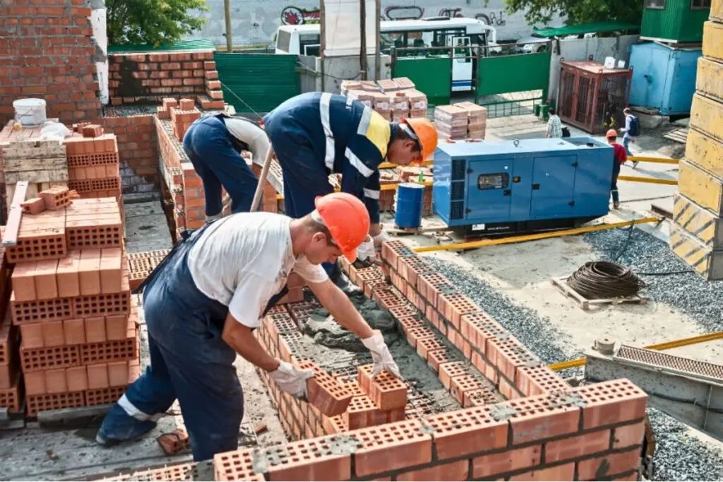 local masonry contractors building house using bricks