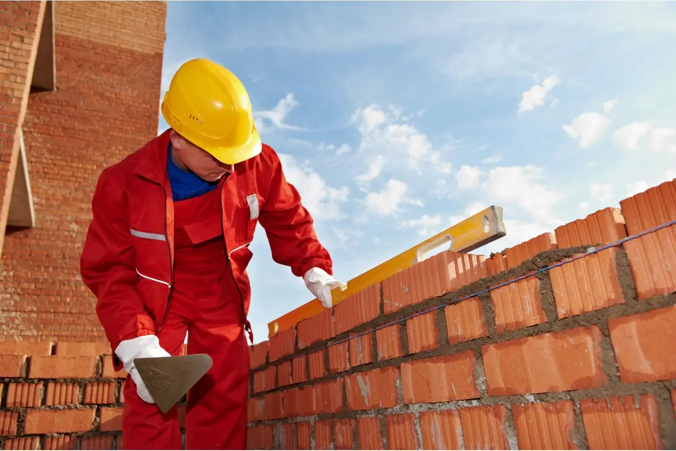 construction mason worker levelling bricklayer