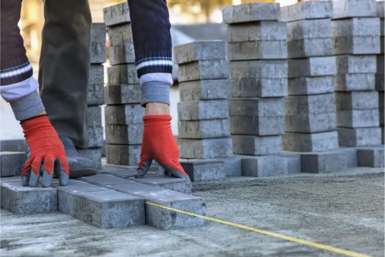 installing paving construction stone block sidewalk