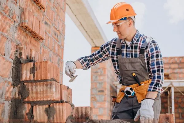 Masonry contractor working on brick laying in Pembroke MA