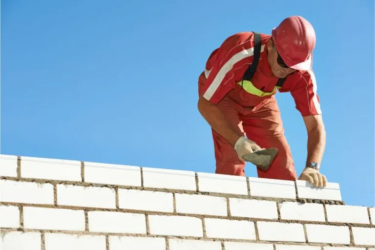 construction mason worker laying custom brick in Hull MA