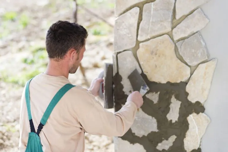 masonry contractor working on a custom masonry stone project in Norwell MA