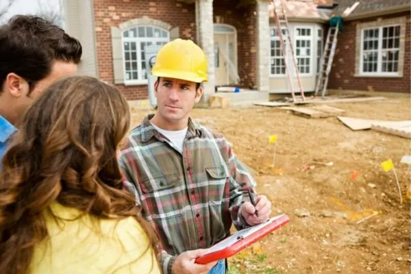 masonry expert talking to client in Marshfield MA