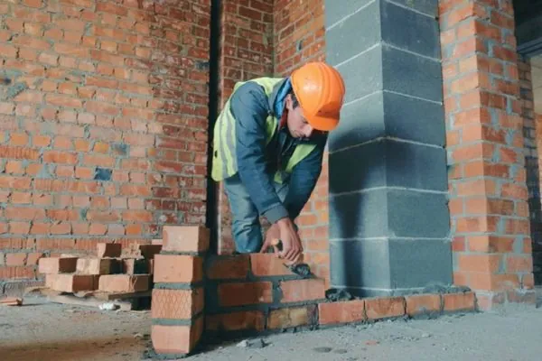 masonry expert working on brick laying in Marshfield MA