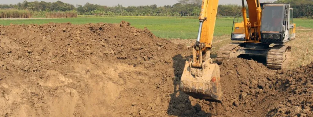 yellow hydraulic construction excavator