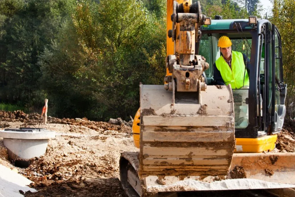 excavator driver on a construction site