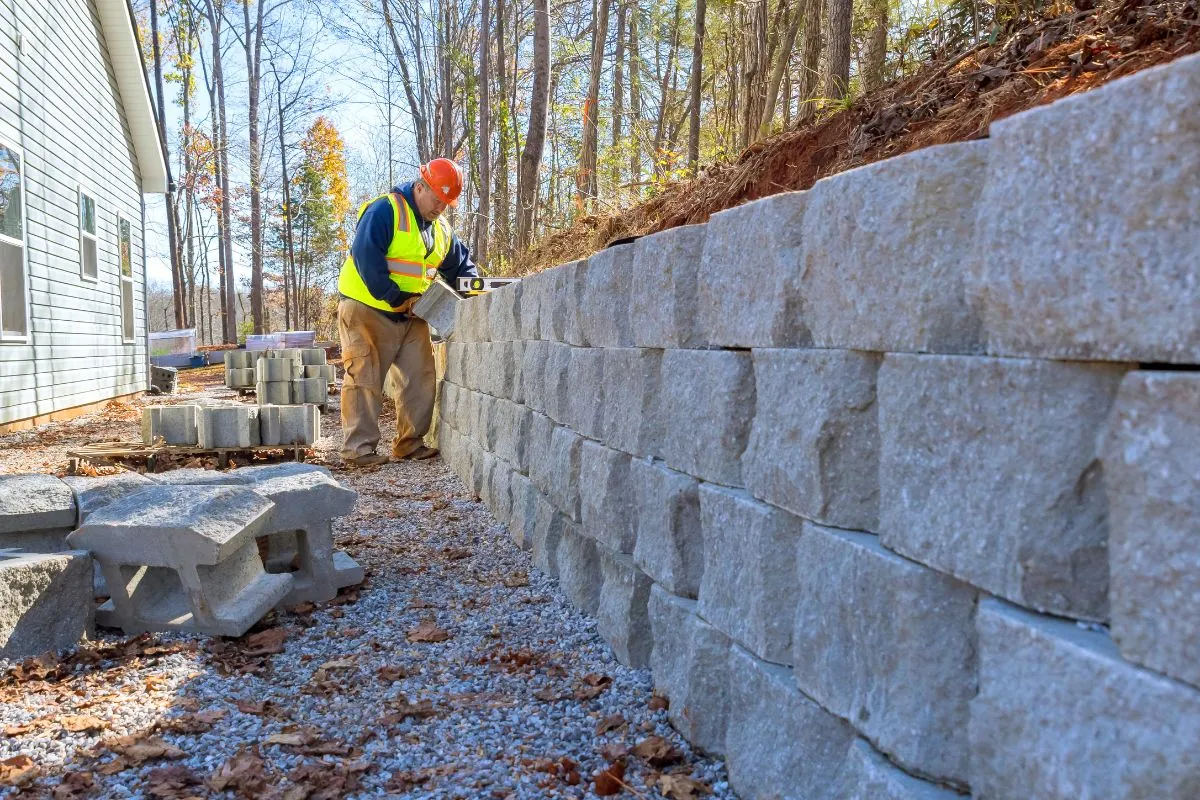 concrete block retaining wall was mounted by a contractor