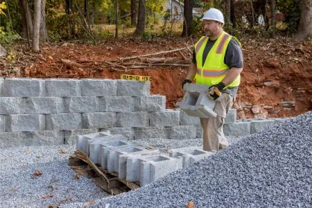 building a retaining wall with retaining blocks on the new property